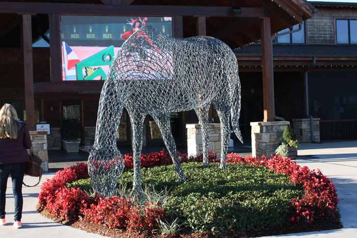 This wire equine statue graces the front entrance to Legends Grille, which overlooks the current main arena.