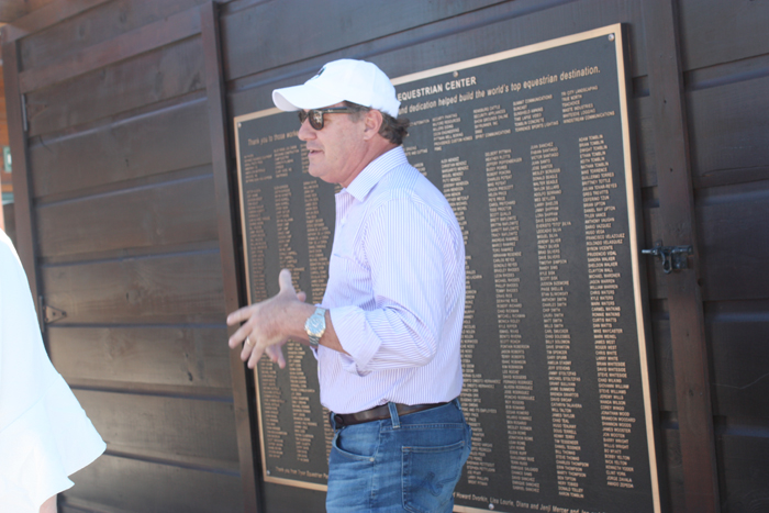 What do you get if you cross Walt Disney with the Energizer Bunny? The visionary Mark Bellissimo, seen standing in front of a plaque that thanks everyone who had a hand in getting TIEC up and running.