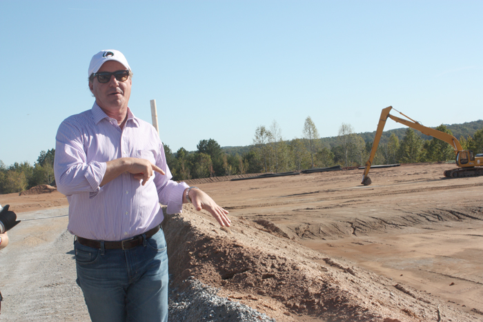 Mark stands at the site of the future five-star Salamander Hotel.