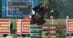 A man jumping a dark bay horse over a fence in Saugerties.