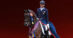A man riding a bay dressage horse.