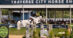 A man jumping a grey horse over a fence at GLEF.