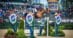 A woman jumping a horse over a fence at the Kentucky Horse Park.