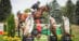 A woman jumping a bay horse over a fence in Ottawa.