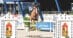 A man jumping a fence in Rabat on a chestnut gelding.