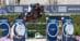 A man jumping a bay horse over a fence in Barcelona.