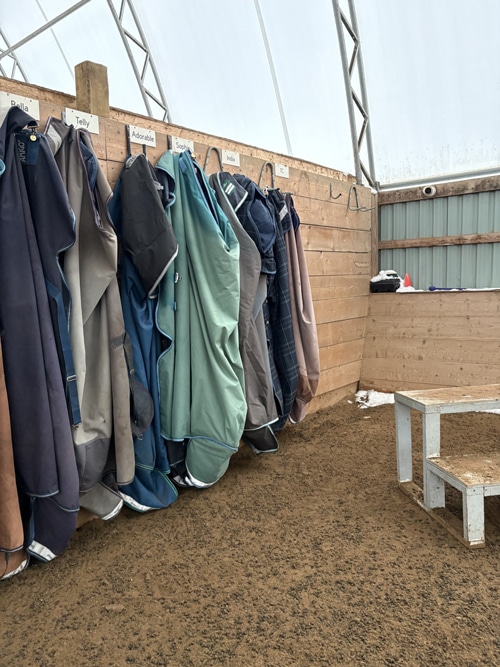 Blankets hanging in the arena.