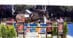 A man jumping a fence in Mexico on a dark bay horse.