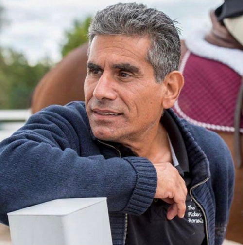 A man at a horse show.