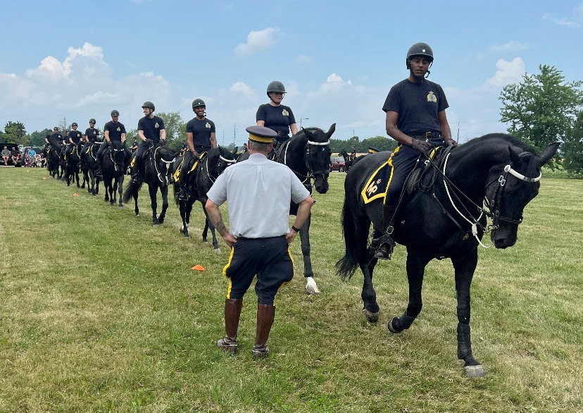 A line of riders warming up.