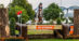 A woman jumping a pain mare over a cross-country fence.