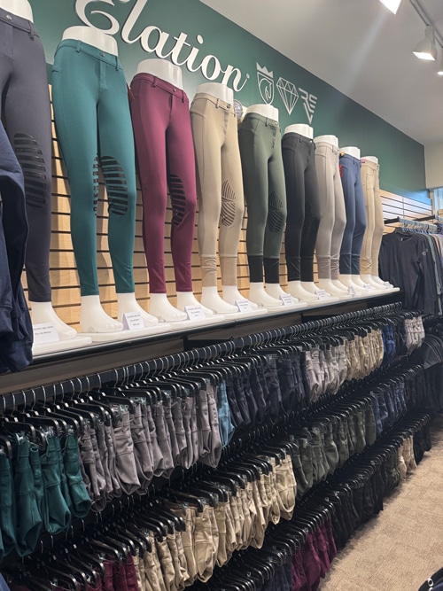 A row of breeches in a Greenhawk store.