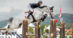 A man jumping a grey horse over a fence in the Hudson Valley.