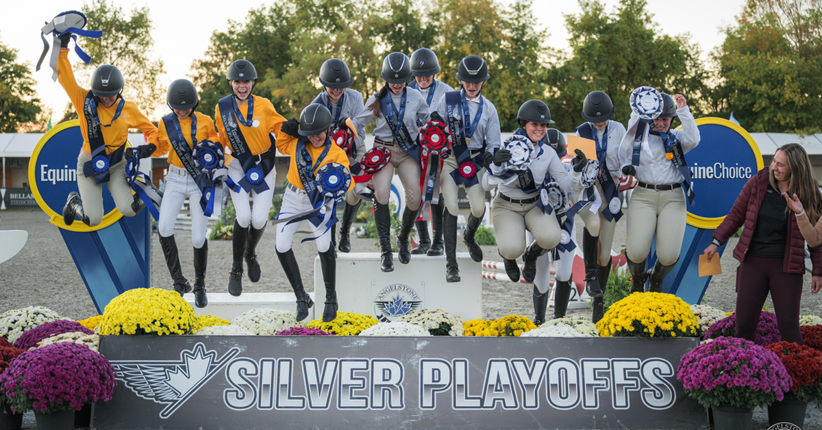 A group of riders on a podium.