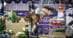 A man jumping a bay horse over a fence at the Royal.
